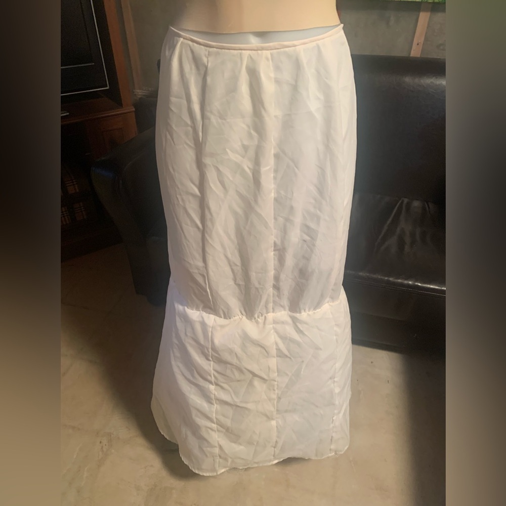 White underskirt with lower petticoat.  Size L (waist is 16” across).